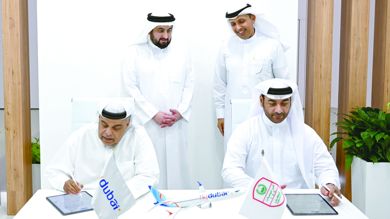 أحمد بن محمد يشهد توقيع مذكرة تفاهم بين «إدارة أمن المواصلات» و«فلاي دبي»