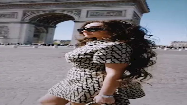 بالصور.. جلسة تصوير جريئة لـ هنا الزاهد في شارع الشانزليزيه والجمهور ي